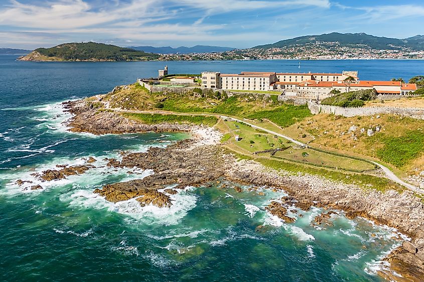 Aerial view of Baiona, a tourist town in Pontevedra, Galicia, Spain, featuring a medieval historical center by the Vigo Bay outlet.