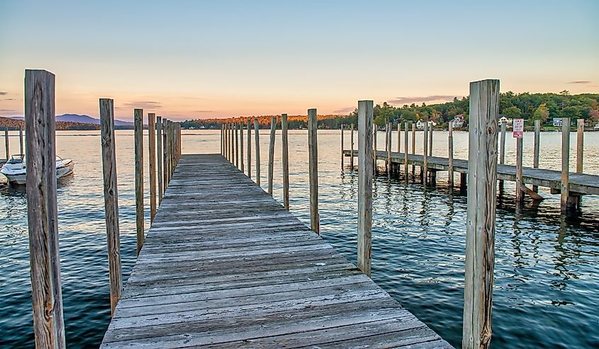 Pier on Meredith Bay, New Hampshire at sunset.