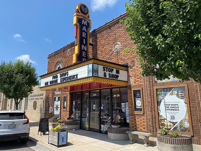 A brick marquee theatre now repurposed as a boutique shopping center.