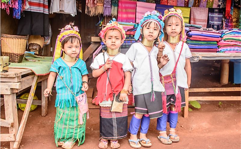 Younger Kayan women wear the neck coils primarily to cater to the tourist industry. Editorial credit: Aung Myat / Shutterstock.com