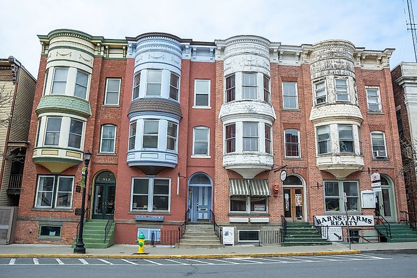 Historic Victorian townhouse building with bay windows in Hudson, New York