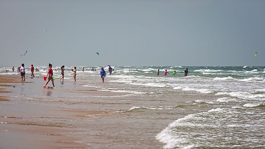 Beachgoers enjoying a beach in South Padre Island