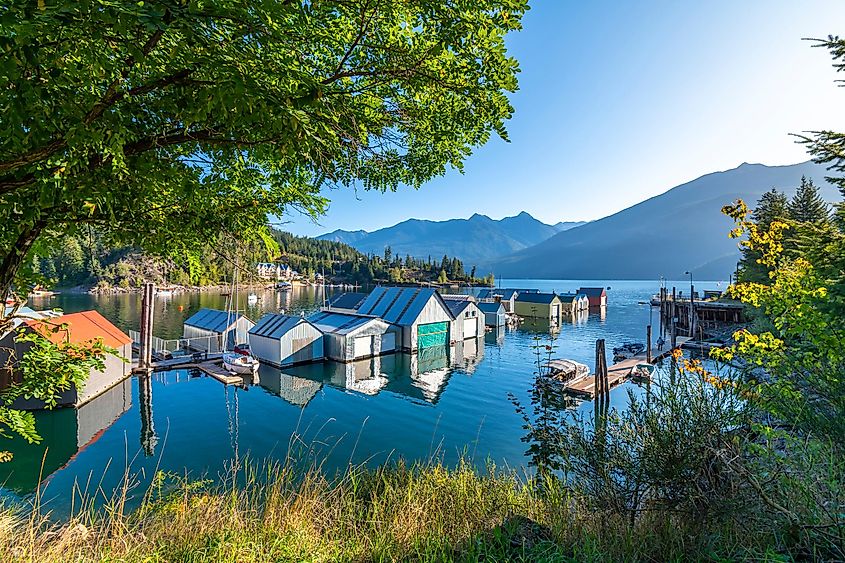 Early morning sunlight on the shipyard, marina and dock on Kootenay Lake in Kaslo Bay, in the rural small village of Kaslo, British Columbia, Canada.