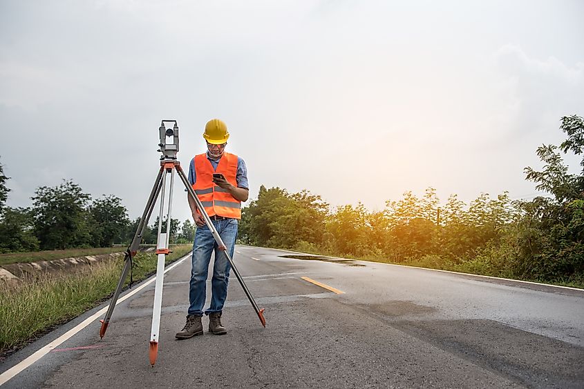 Engineer is using Surveyor equipment.