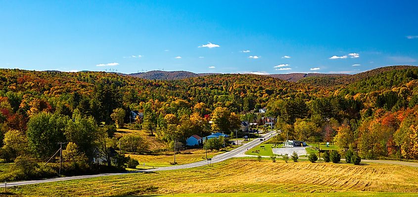 The village of Willmington, Vermont on an autumn morning with a blue sky.