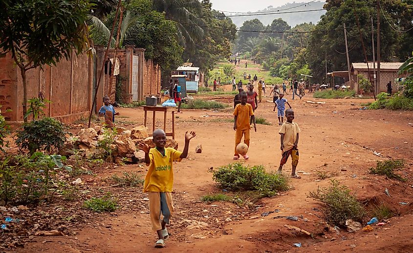 Children playing football in the streets of a town in the Central African Republic. 