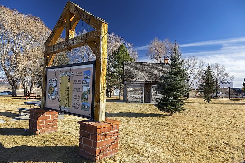 PANGUITCH, UTAH, UNITED STATES - NOVEMBER 29, 2017: Sign Table in front of Old Wild West Log Cabin in Mormon Pioneer Heritage Park