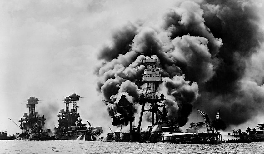 Pearl Harbor and three stricken US battleships