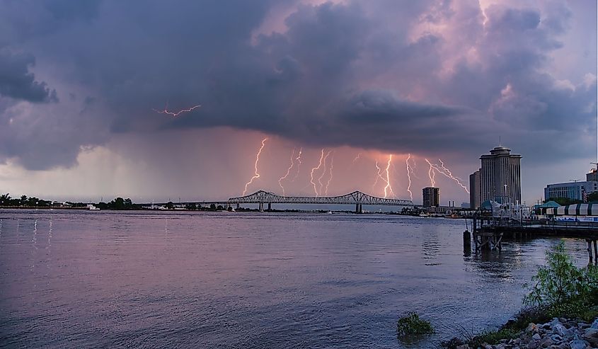 New Orleans on the Mississippi River with passing storm