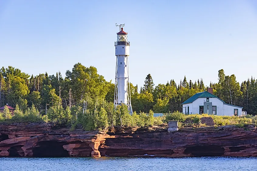 Sea caves and lighthouse of The Apostle Islands in Bayfield, Wisconsin.