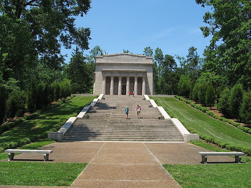 The First Lincoln Memorial for 16th President Abraham Lincoln showing humble beginnings. Enshrines symbolic birthplace cabin. Constructed 1911.