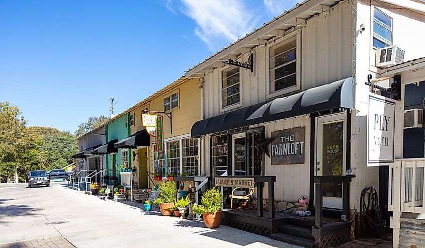 The small shops at Wimberley Square on a sunny day