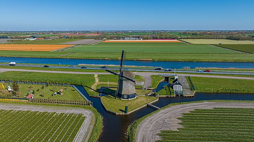Aerial drone view of green Dutch polders in the Netherlands.