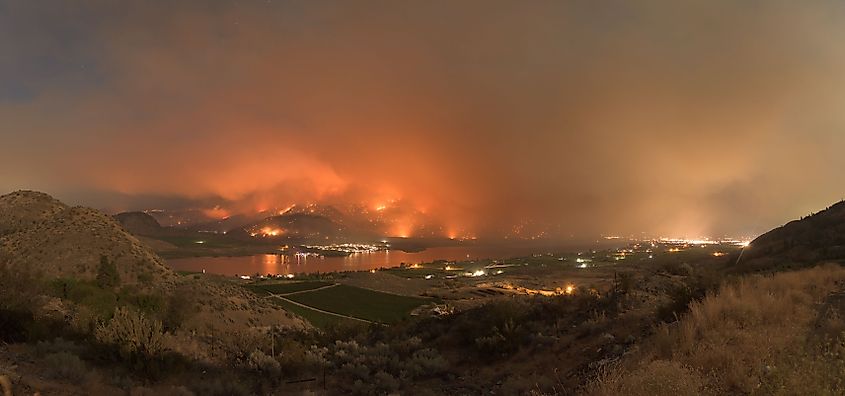 A blazing orange and yellow sky caused by a wildfire near Osoyoos Lake, British Columbia, Canada