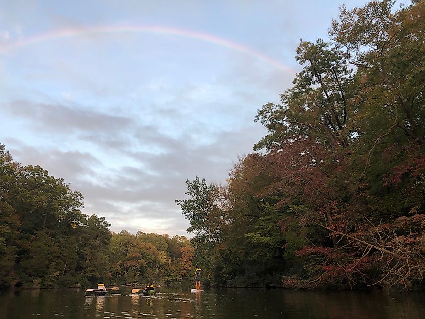 People kayaking on Lake Matoaka in Williamsburg, Virginia