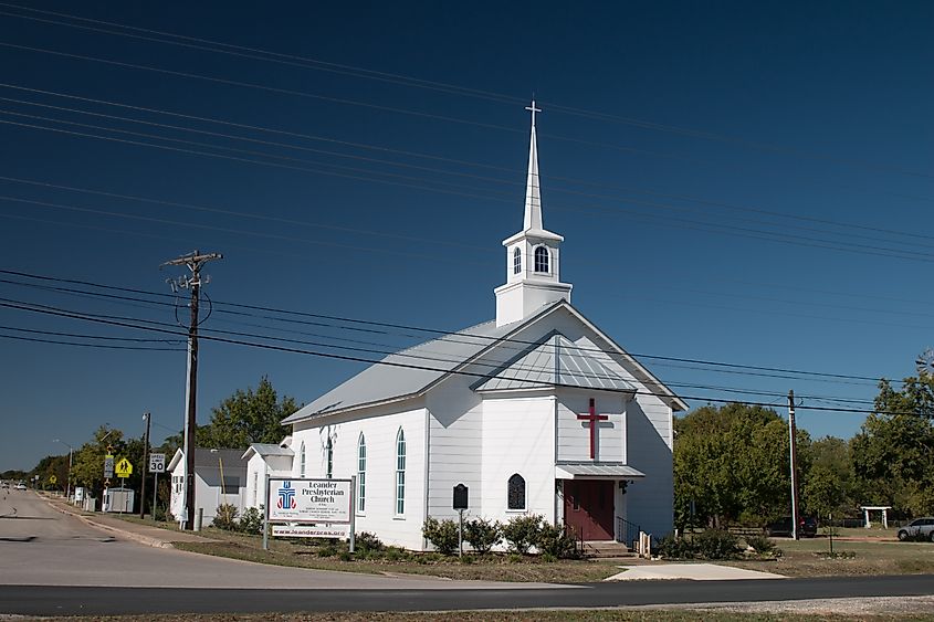 Leander Presbyterian Church building in Leander, Texas, with a simple gabled roof and white wood siding