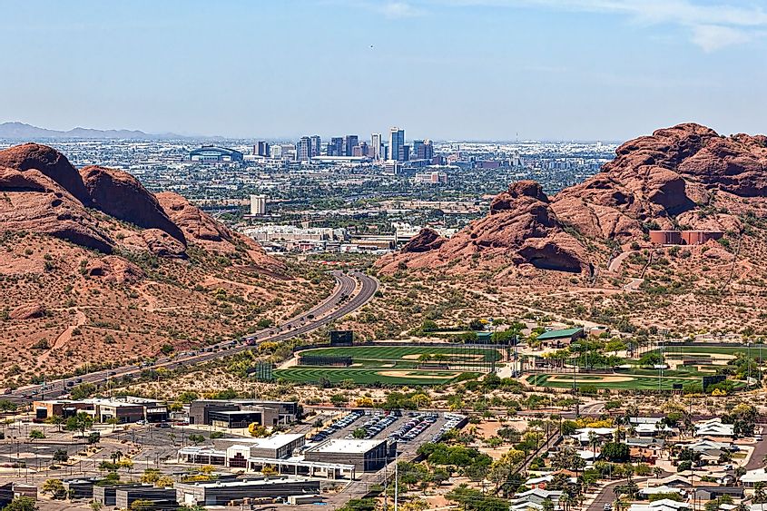 Downtown Phoenix, Arizona, aerial view from Scottsdale framed between the Papago Buttes