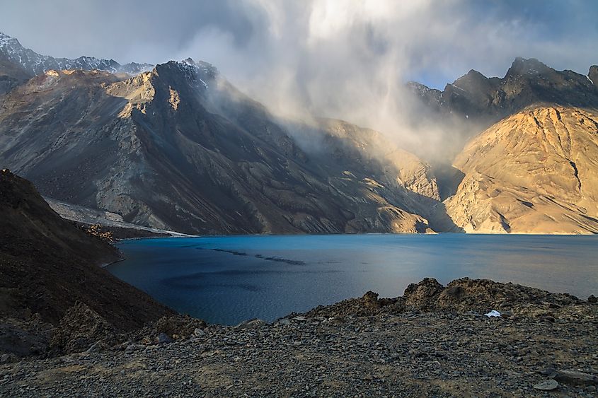 The remote Sarez Lake surrounded by the lofty peaks of the Pamir Mountains in Tajikistan.