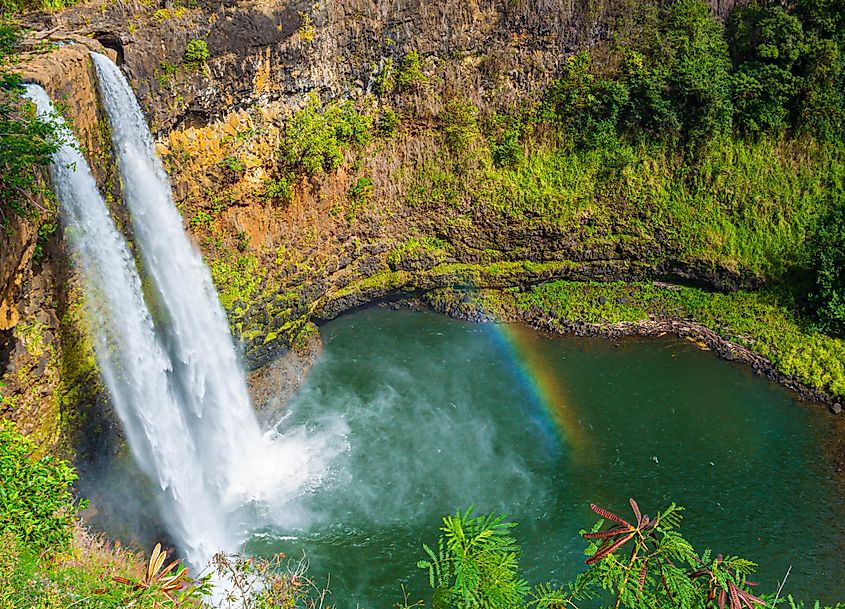 The Wailua River cascading over Wailua Falls, Kauai, Hawaii.
