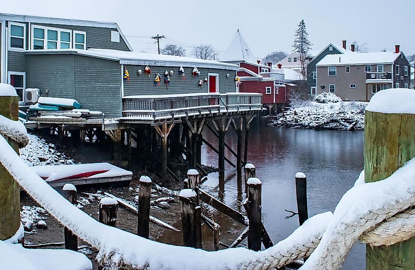 Home pier in Kennebunkport Harbor, Maine during a snowstorm