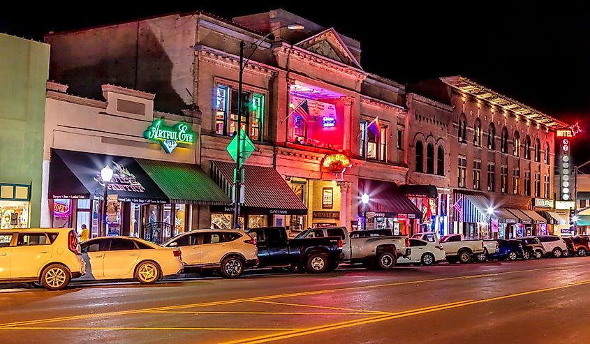 Historic Whiskey Row streetscape in Prescott Arizona photographed at night.