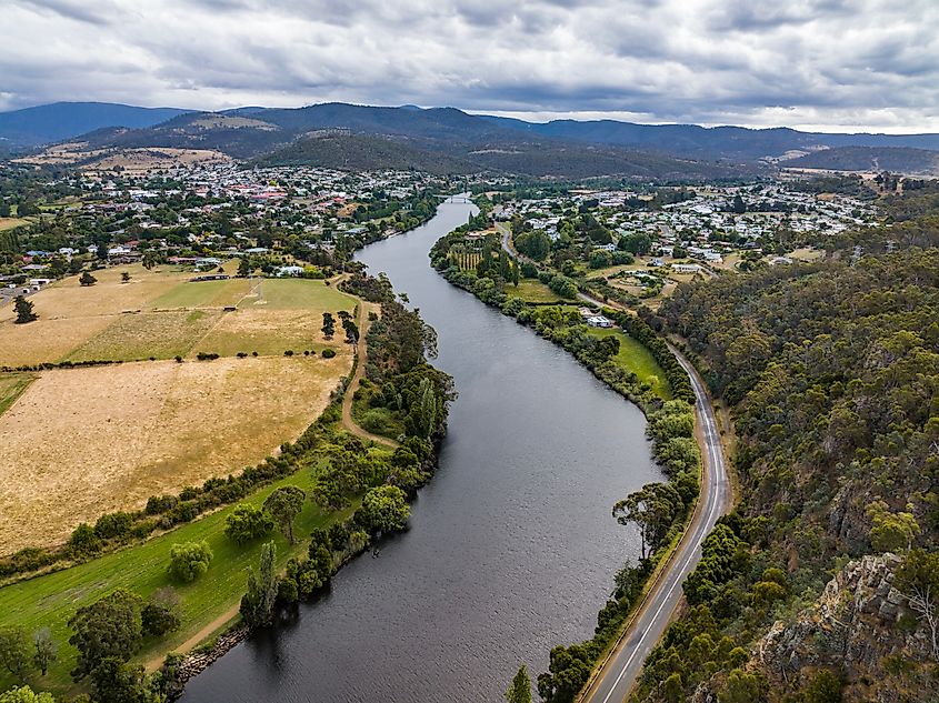 Aerial view of the River Derwent flowing through New Norfolk, Tasmania, Australia.