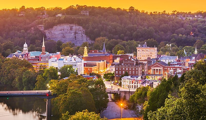 Frankfort, Kentucky, USA town skyline on the Kentucky River at dusk.