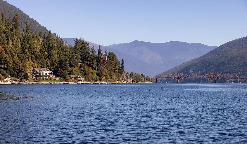 Scenic view of Kootenay River and a small tourist town in Nelson, British Columbia, Canada