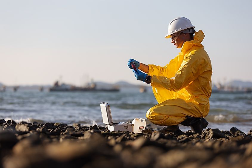 Water quality testing at a lake.