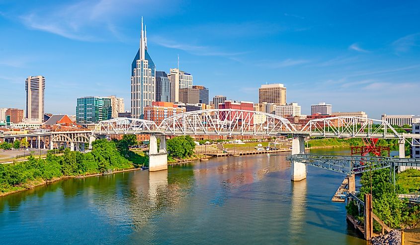 Nashville, Tennessee, US downtown city skyline on the Cumberland River.