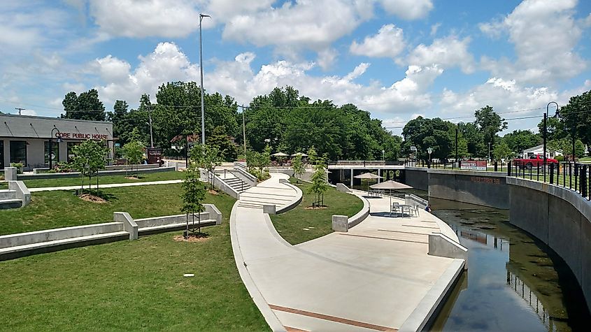 Spring Creek runs through downtown Springdale, including through Turnbow Park, via Brandonrush on Wikipedia