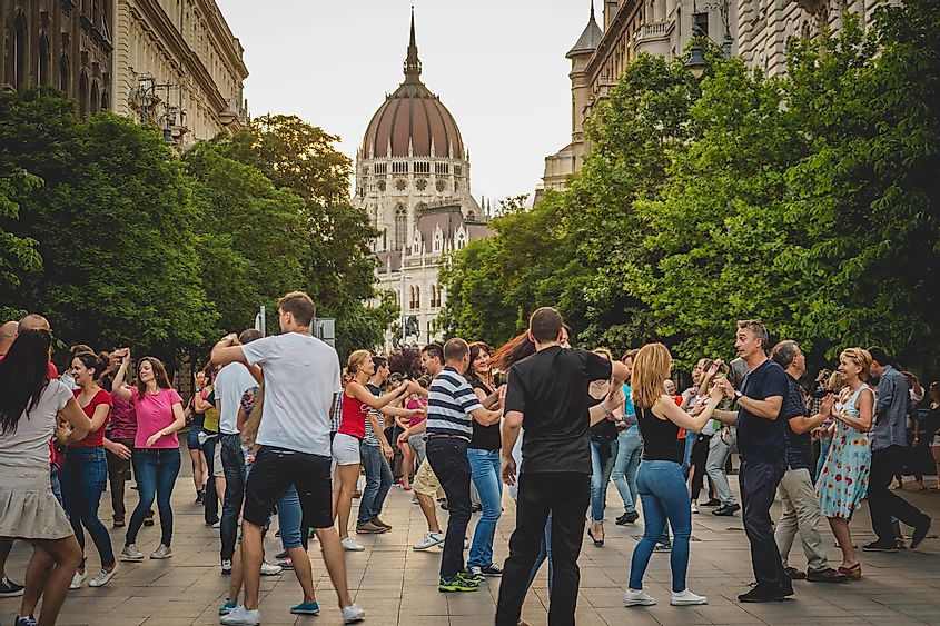 People dancing in the street during a food festival in Budapest (Hungary). June 2017.