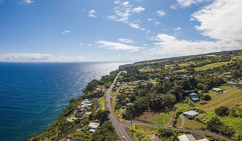 Aerial view of homes along the waterfront in Honokaa, Hawai'i