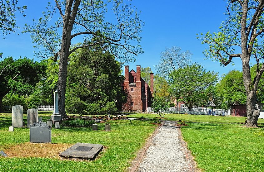 Bath, North Carolina: Burial ground and c. 1774 Palmer-Marsh House, one of the oldest dwelling residences in the State, with its unique double chimneys on the South front. 