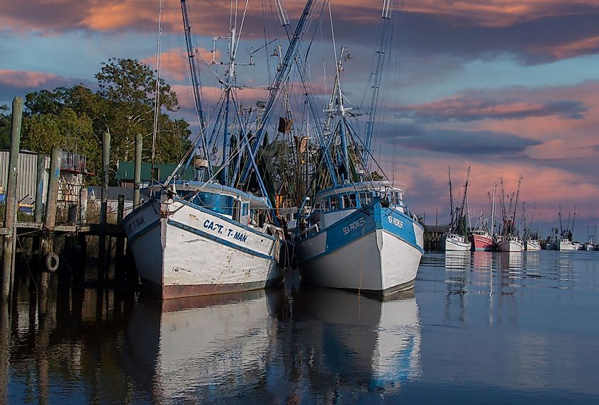 Shrimp boats moored at sunset at a dock near Darien, Georgia