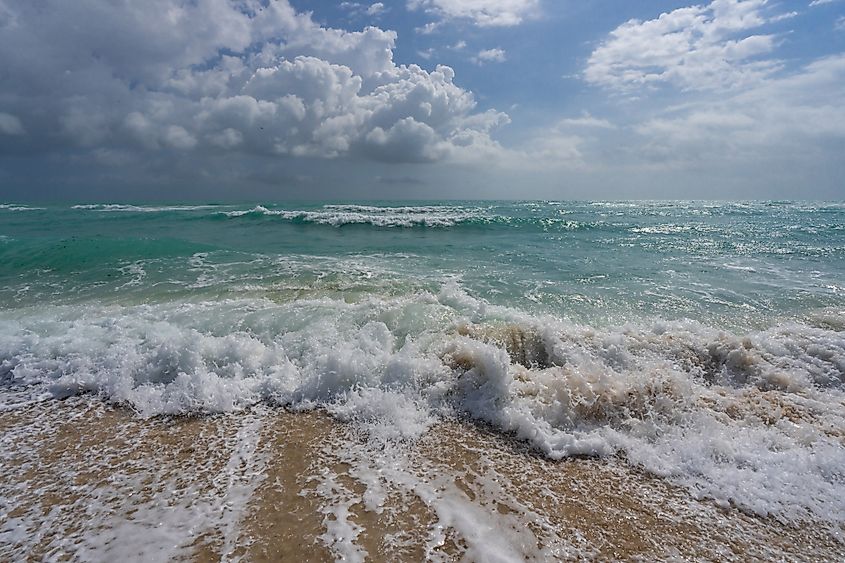 Ocean waves hitting beach.
