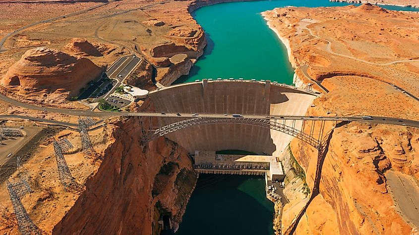 Aerial view of Glen Canyon Dam and Glen Canyon Dam Bridge over Lake Powell, Glen Canyon National Recreation Area, Coconino County, Page, Arizona, USA.