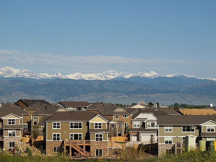Overlooking homes in Erie and the mountains in the distance.