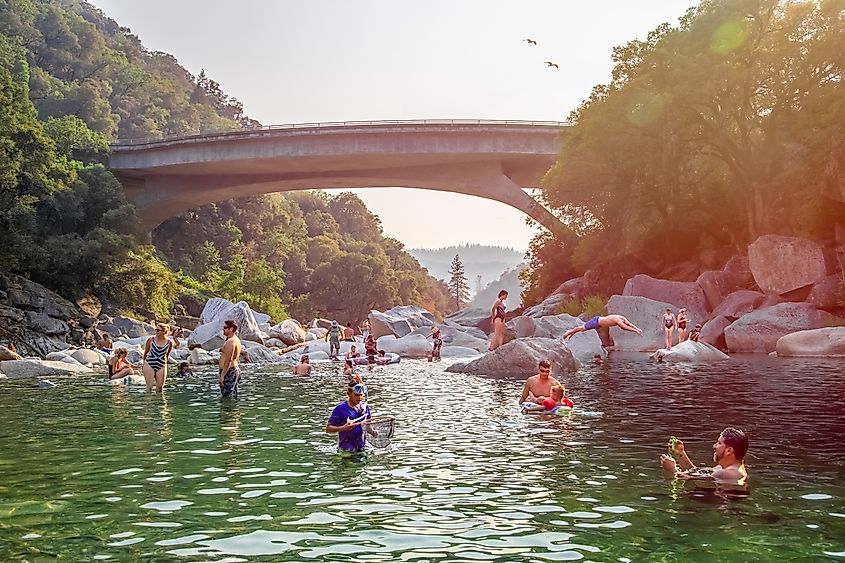 South Yuba River, Nevada City, California- July 28, 2018: Vacationers frolicking in the river