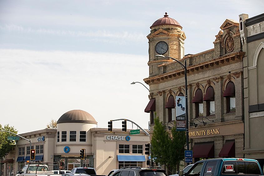 Afternoon sunlight shines on historic buildings in the core of downtown Oakdale.