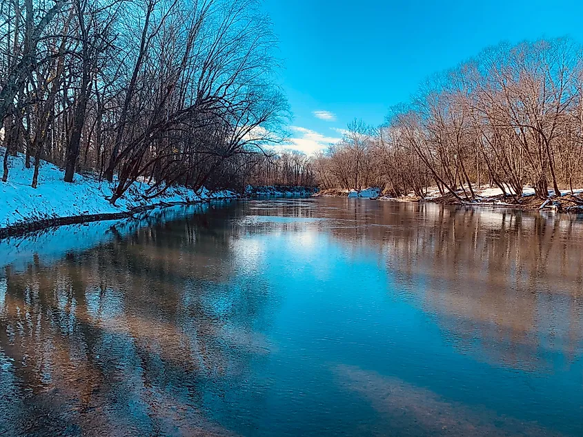 Snowy banks of black river in southeast Missouri.