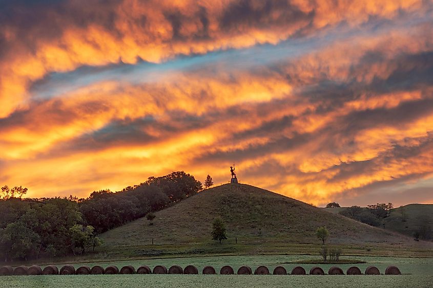The Black Viking statue under brilliant sunrise skies in Fort Ransom, North Dakota.