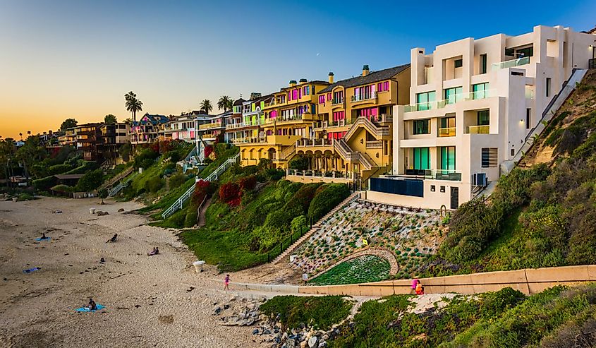 Houses on cliffs above Corona Del Mar State Beach, seen from Inspiration Point, in Corona del Mar, California.