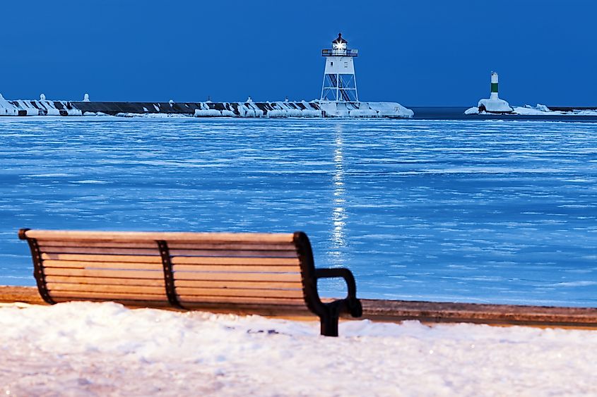 View of the Grand Marais lighthouse during winter.