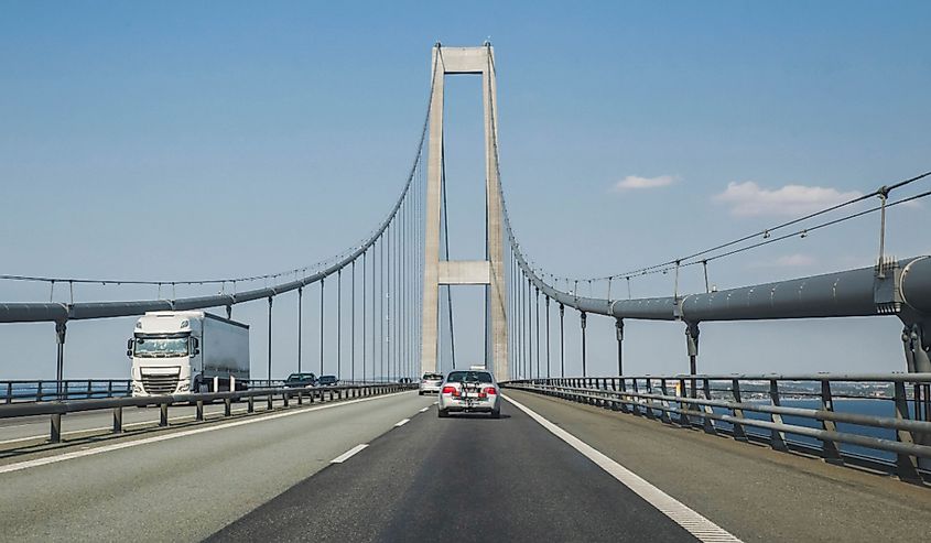 Cars and trucks on the Great Belt Bridge, crossing the North Sea in Denmark.