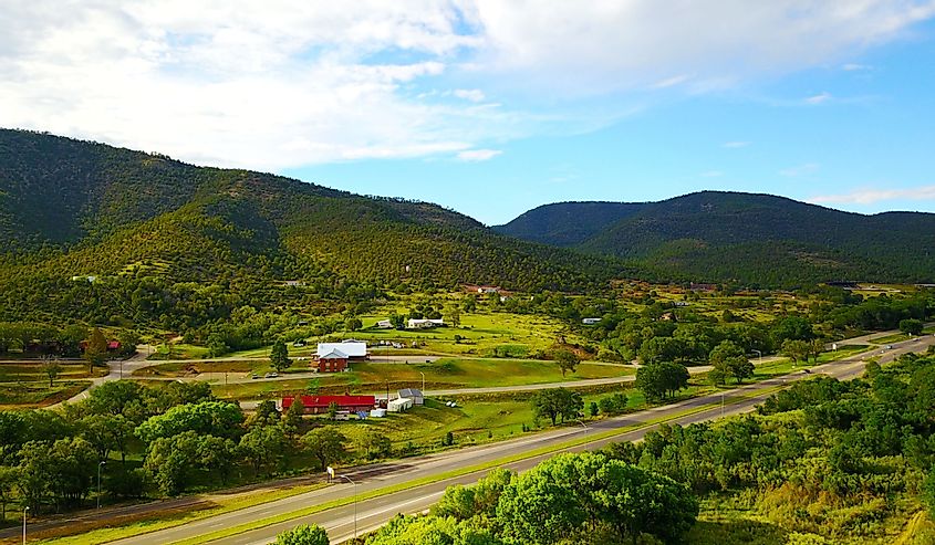 Mountain valley with small town in Mescalero, New Mexico