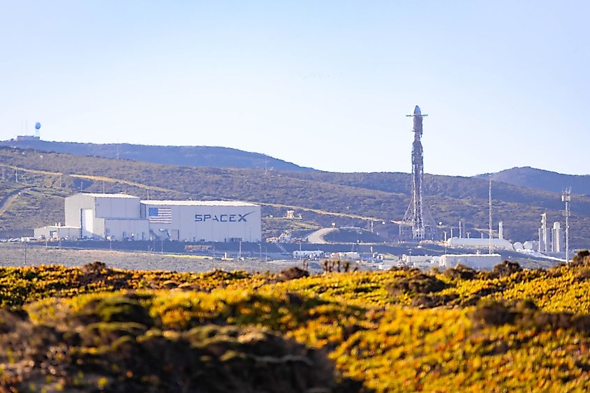 SpaceX Falcon rocket standing on launch pad preparing for liftoff at California aerospace facility. Editorial credit: Photo Spirit / Shutterstock.com