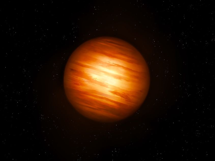 Brown dwarf in space isolated. Massive gas planet with hot atmosphere. Half star on black background.