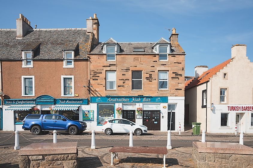 Anstruter, UK - June 9 2023: Renowned fish chip takeway, Fish Bar and popular tourist summer attraction in the seaside village of Anstruther, East Neuk, Fife, Scotland, UK.