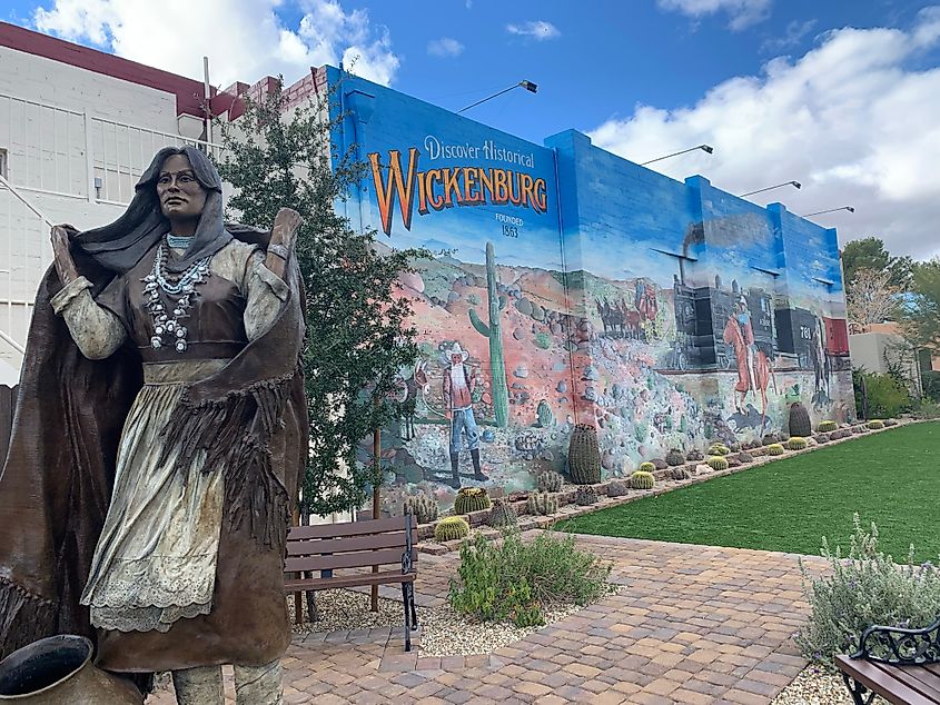 Street side murals and statues in Wickenurg, Arizona.